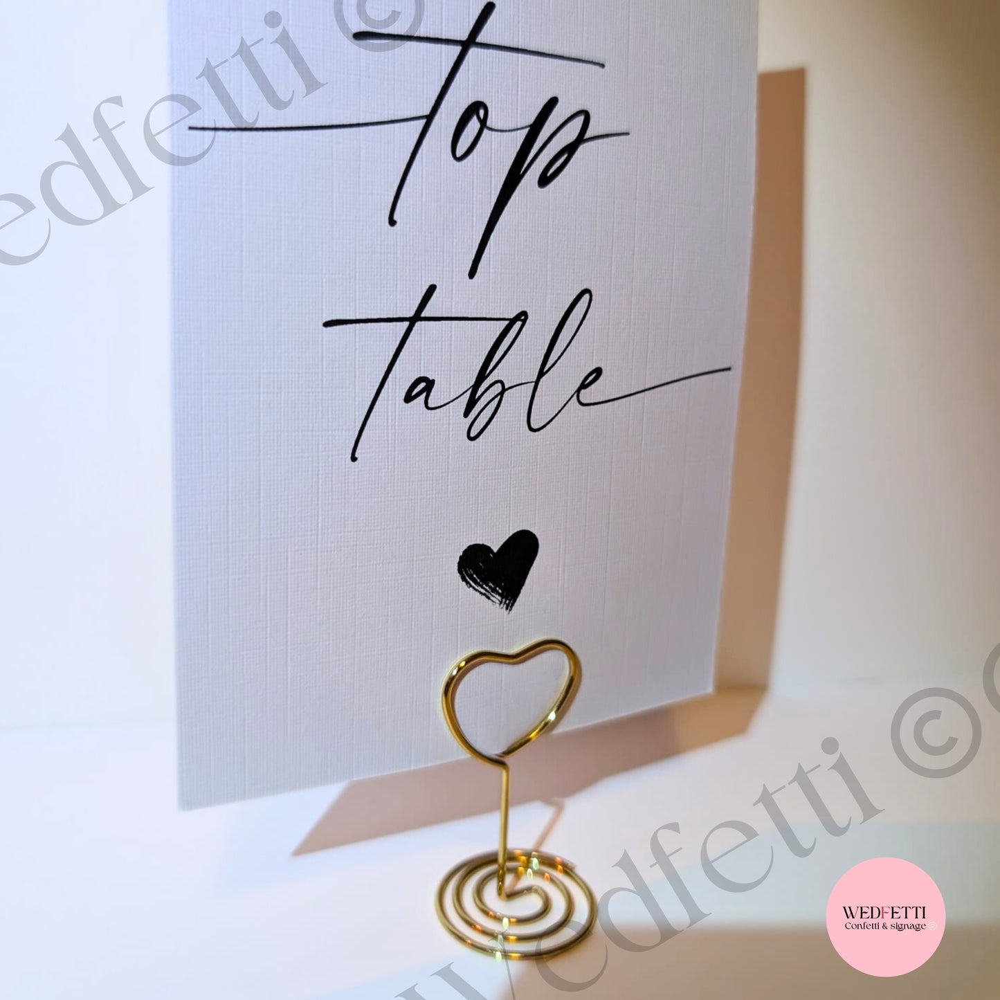 Rose gold heart sign stand