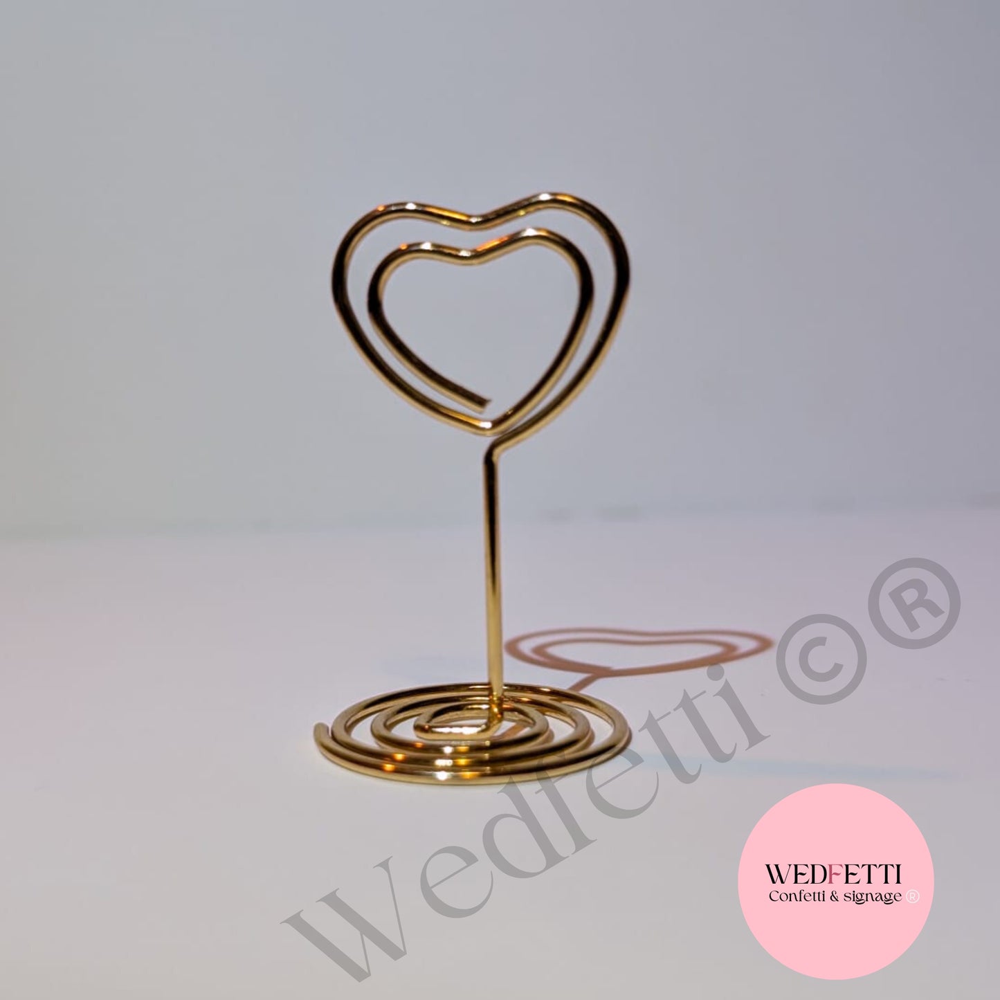 Gold heart sign stand